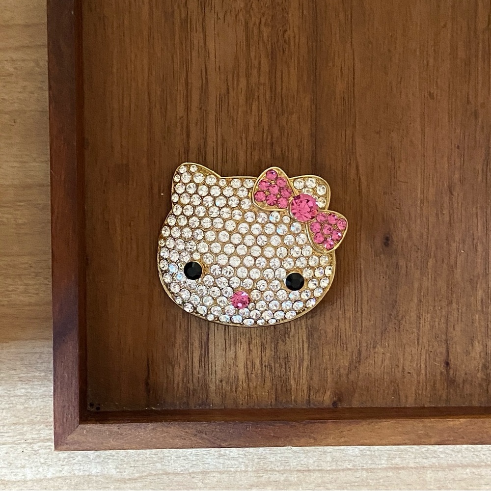Crystal Hello Kitty gold plated pin.